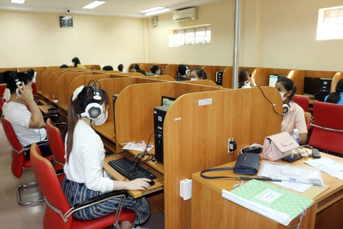 Students taking a computer-based practical exam at Mekong University